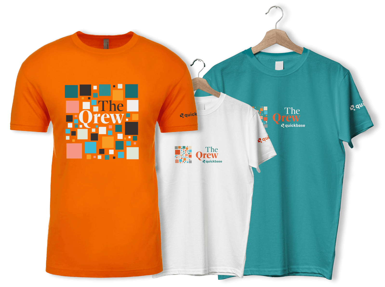 Three t-shirts with Qrew branding